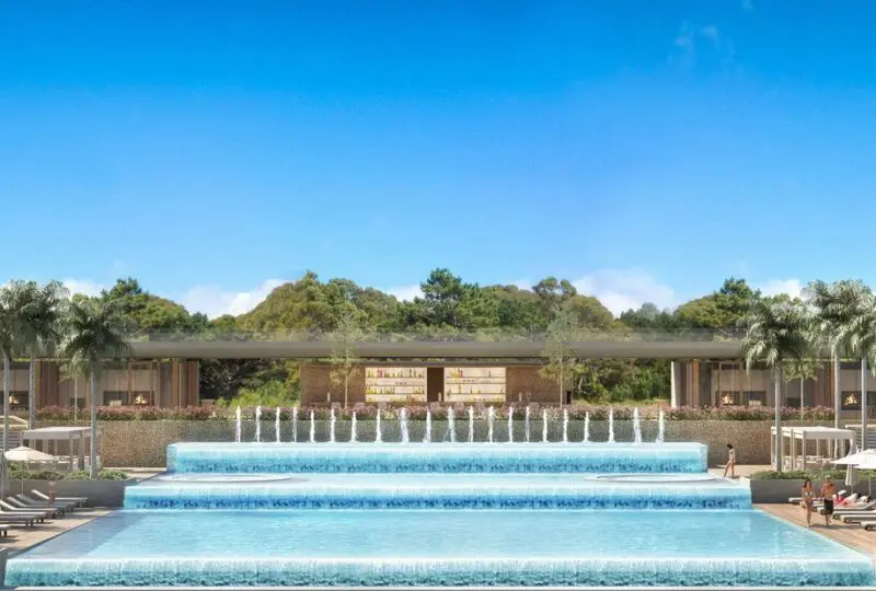 Horus Agencia Inmobiliaria, vista de piscina y áreas recreativas en un entorno lujoso y moderno. Espacios ideales para la compra o inversión en propiedades de alta calidad.