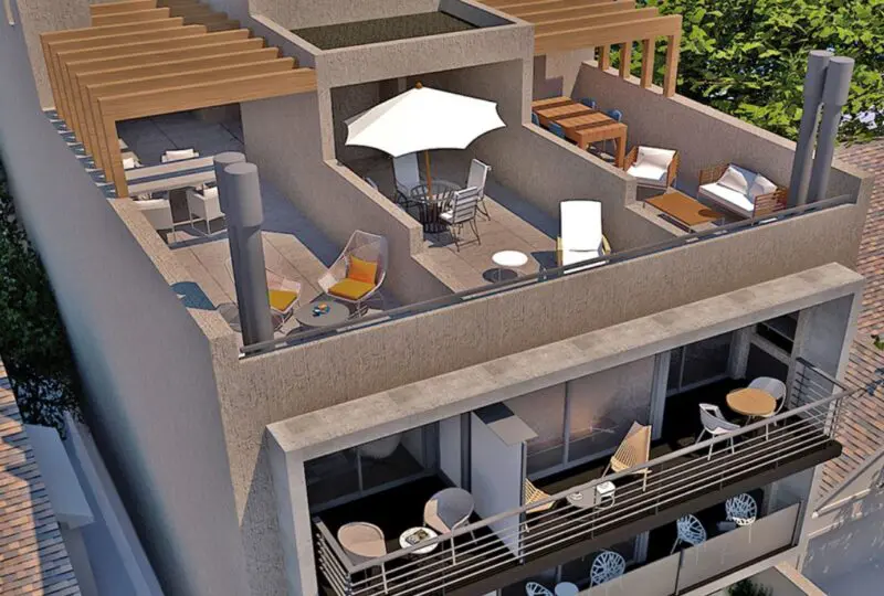 Vivienda moderna con terraza en la azotea con zona de descanso y área para barbacoas, perfecta para relajarse y disfrutar del aire libre en un entorno residencial de alta calidad.