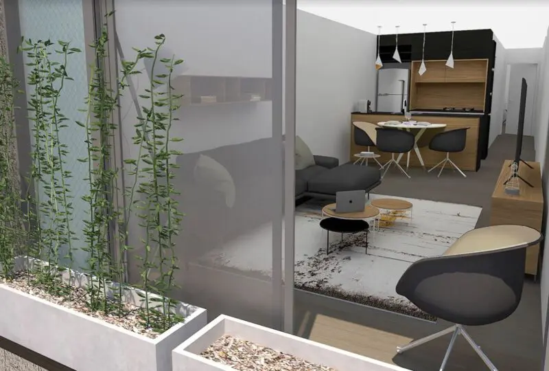 Oficina moderna con balcón y vista a jardines, espacio de trabajo y área de descanso, ideal para residencias y apartamentos en venta o alquiler, diseñada por Horus Real Estate Agency.