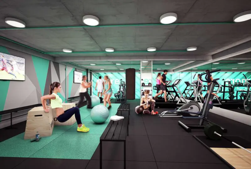 Ejemplo de un gimnasio moderno en una propiedad en venta o alquiler presentada por Horus Real Estate.