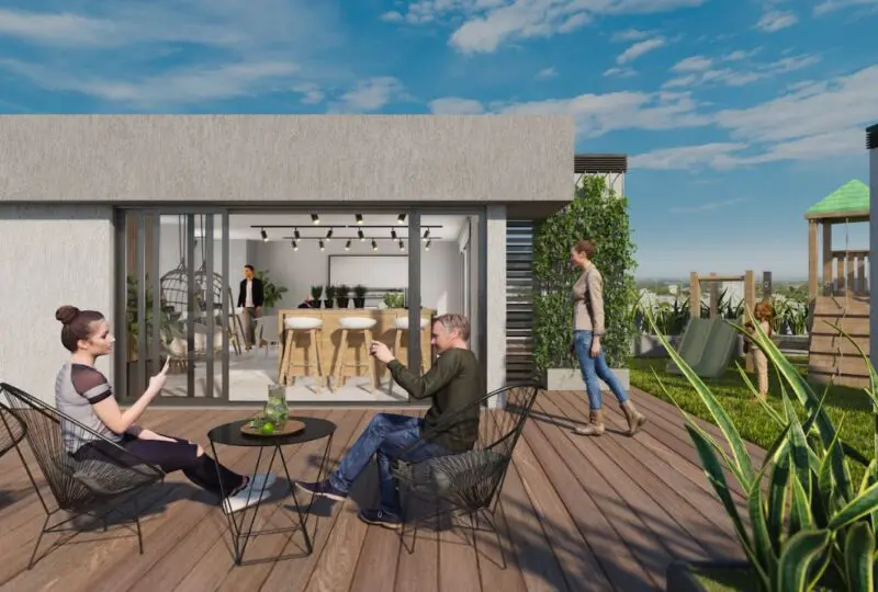 Amplia terraza con vistas panorámicas y zona de descanso, ideal para vivir experiencias únicas en la ciudad, rodeada de naturaleza y moderna arquitectura.