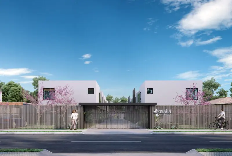 Moderno complejo residencial en Osaka con diseño minimalista, áreas verdes y control de acceso para vivir en un entorno exclusivo y seguro.