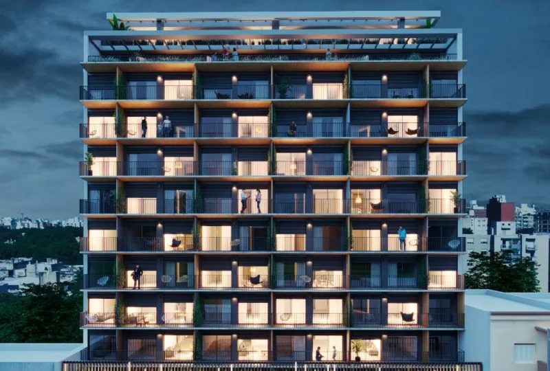 Moderno edificio residencial de apartamentos en urbanización exclusiva, con amplias terrazas y áreas comunes de lujo, ideal para inversión inmobiliaria y vivienda en la Ciudad de México.