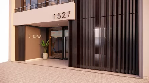 Fachada moderna de agencia inmobiliaria Horus, edificio elegante con detalles en madera y vegetación, ubicada en Avenida 1527, ideal para servicios de compra, venta y alquiler de propiedades. .